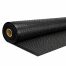 Detail view of a black anti-fatigue rubber mat with raised dome stud pattern and straight edge profile on a white background.
