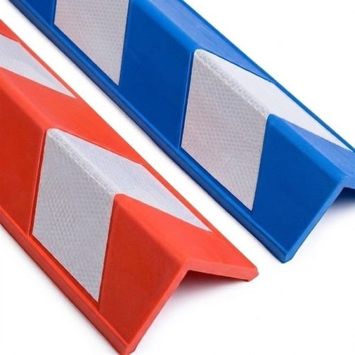Foam corner protectors in red-white and blue-white with reflective panels for wall edge safety and visibility