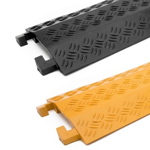 Black and yellow interlocking drop over cable covers for protecting cables across walkways and light vehicle crossings.
