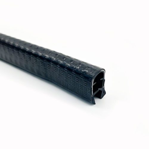 Alt text: Close-up of black rubber edge trim profile with textured outer surface and internal gripping section.